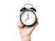 hand-man-holding-vintage-clock-1-1-1024x809